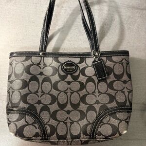Black and grey monogram small city tote from Coach